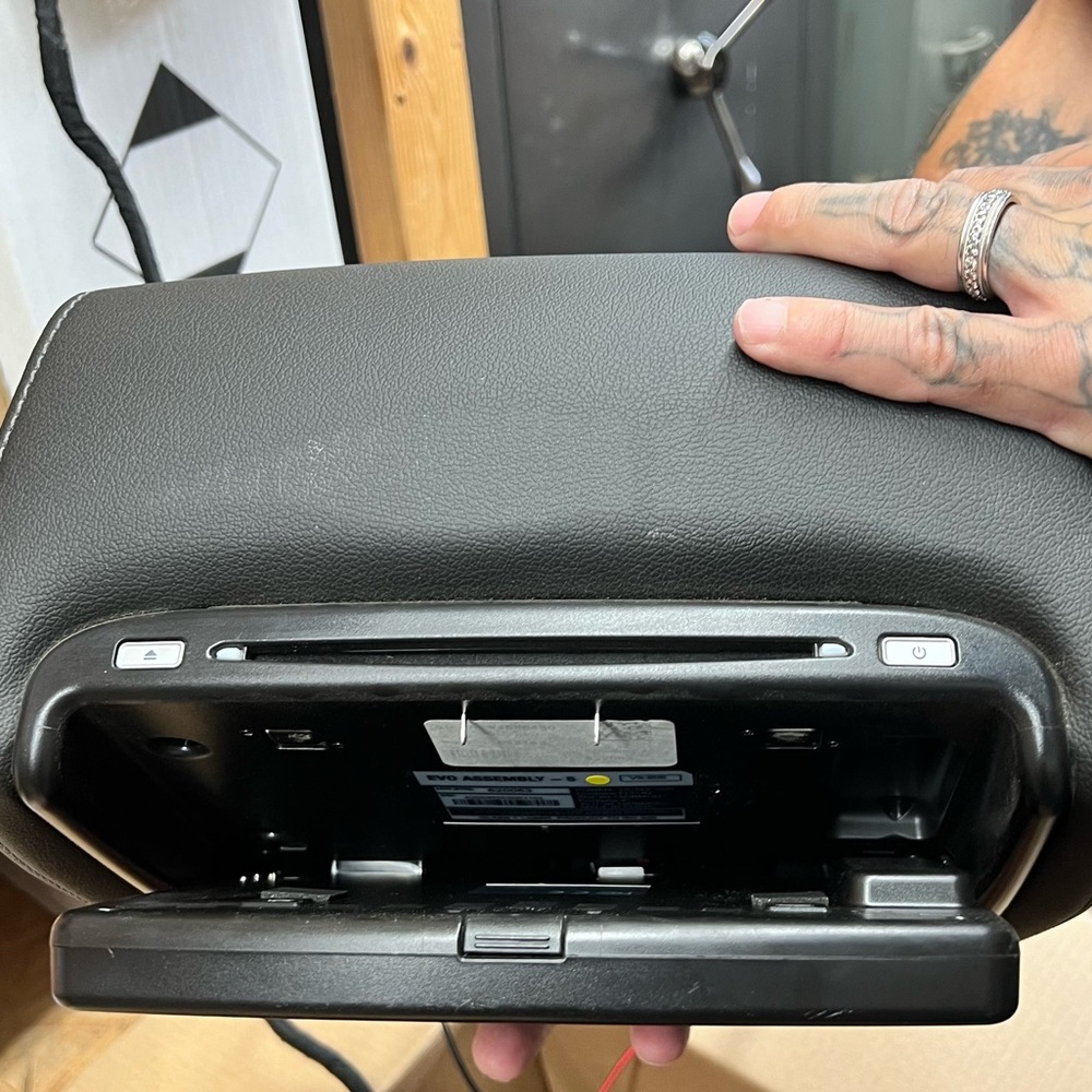 GM accessories head rear with DVD player. Never used